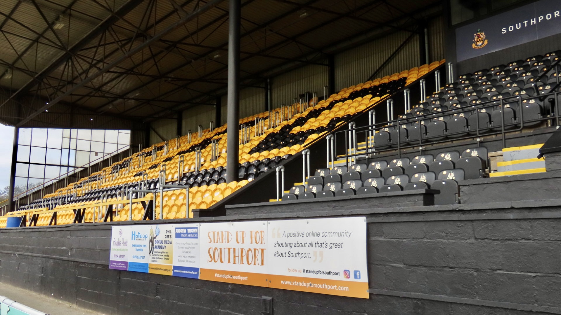 The Stand Up For Southport board at Southport FC