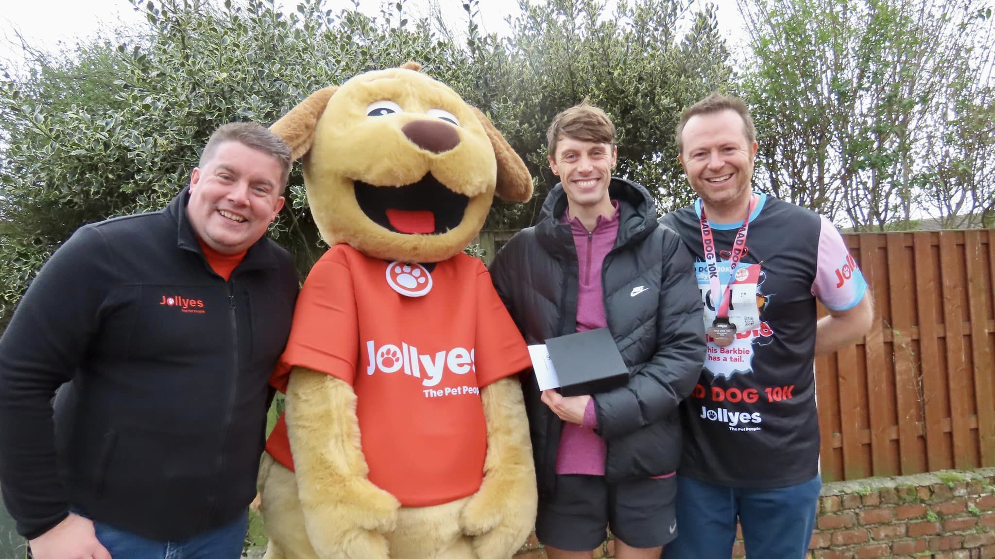 Hundreds of runners enjoyed the Southport Mad Dog 10lk run sponsored by Jollyes - The Pet People. Jollyes head of marketing Phil Turner-Naylor (left); Jollyes CEO Joe Wykes (right); and men's race winner Luke Minns 