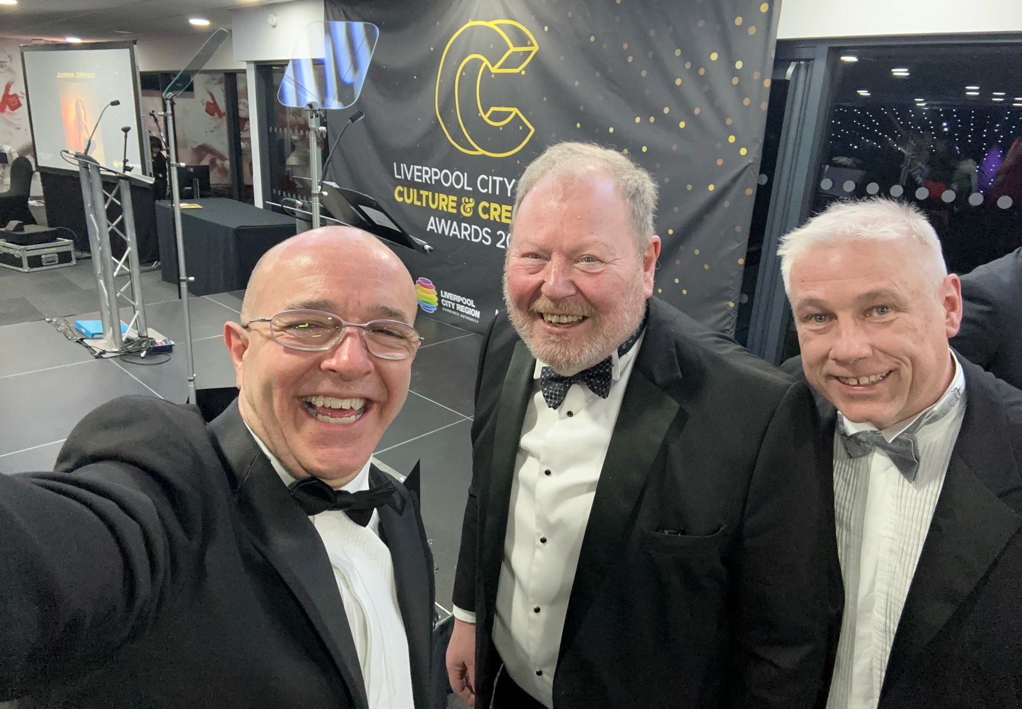 Brendan Riley Director of Big Comedy UK with radio legend Roger Phillips and Andrew Brown Director of Stand Up For Southport at the 2024 Liverpool City Region Culture and Creativity Awards