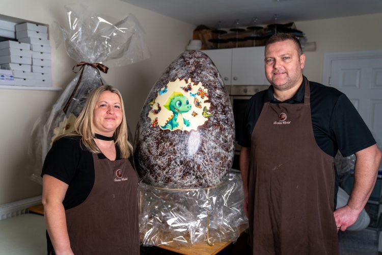 Chocolate Whirled owners Laura and Simon Stevens with one of the gigantic eggs