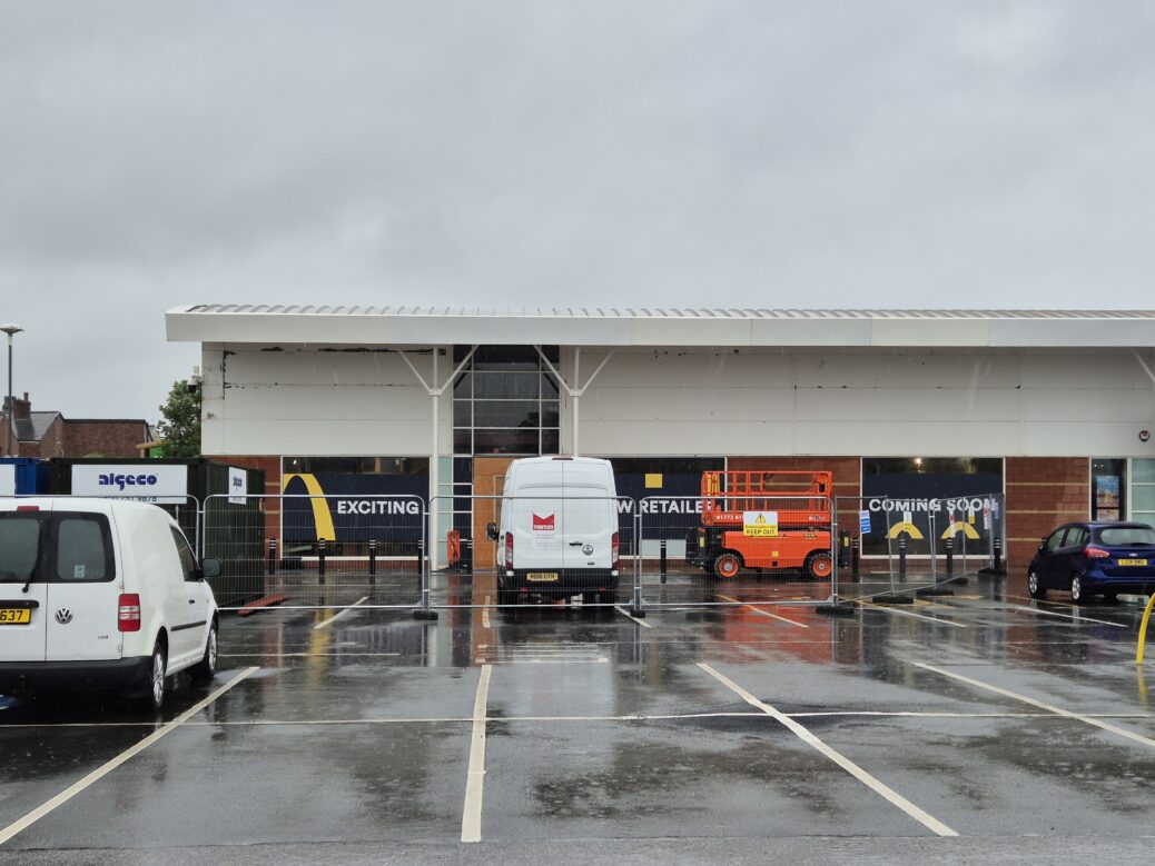 The new McDonald's unit surrounded by gates and vans