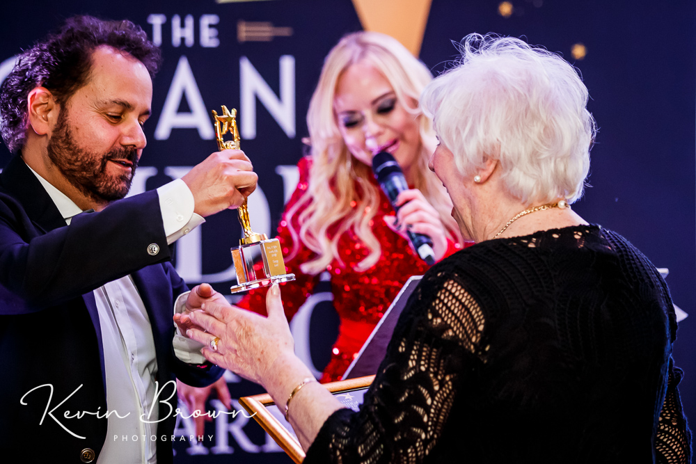 Barbara Rouse was awarded Sefton Courage Award at the 2024 Grand Pride Of Sefton Awards at The Grand in Southport by Peter Equizi from Capelli Hair Studio in Southport. Photo by Kevin Brown Photography