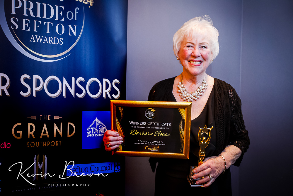 Barbara Rouse was awarded Sefton Courage Award at the 2024 Grand Pride Of Sefton Awards at The Grand in Southport by Peter Equizi from Capelli Hair Studio in Southport. Photo by Kevin Brown Photography