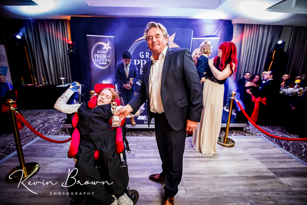The 2024 Pride Of Sefron Awards at The Grand on Lord Street in Southport. Child Of Courage Award winner Dylan Roberts with Southport Pleasureland owner Norman Wallis Photo by Kevin Brown Photography