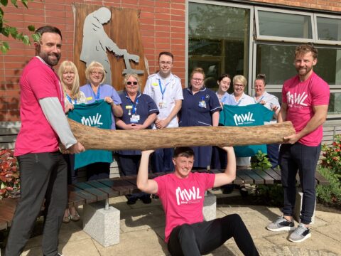 Friends set off from Southport Hospital carrying 30kg log on 26 mile trek to support dementia patients