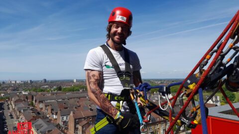 Matthew Fearon raises £1,234 for Queenscourt Hospice after completing Anfield Abseil