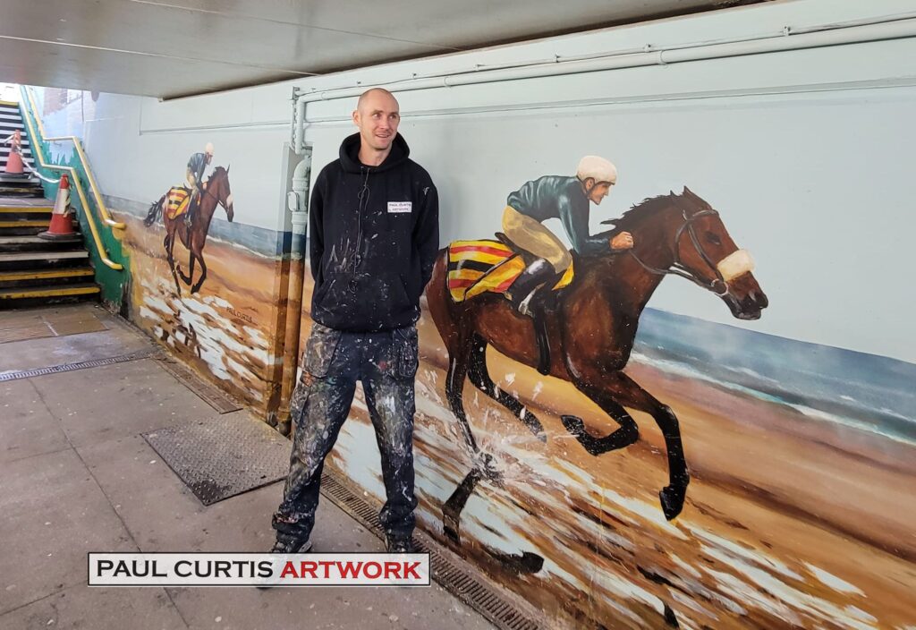 Street art by Paul Curtis in the underpass at Birkdale Train Station in Southport