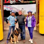 Walkers take part in the 2024 Star Trekk night walk to raise money for Queenscourt Hospice. Southport Pleasureland CEO Norman Wallis (centre) with Dianne Gillespie (left) and Liz Hartley (right) from Queenscorut Hospice