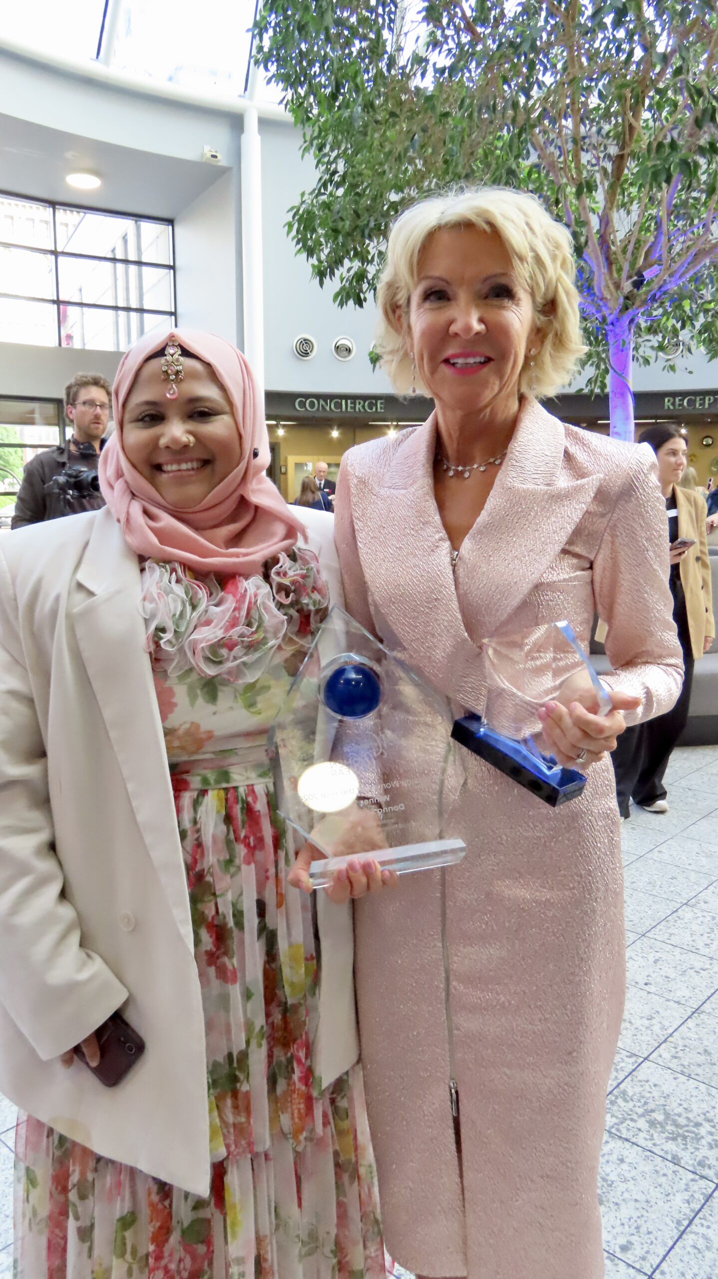 Donna Scully has been honoured as the winner of the 2024 Merseyside Women Of The Year Awards. She is pictured with 2022 Merseyside Women Of The Year Awards winner Jubeda Khatun. Photo by Andrew Brown Stand Up For Southport