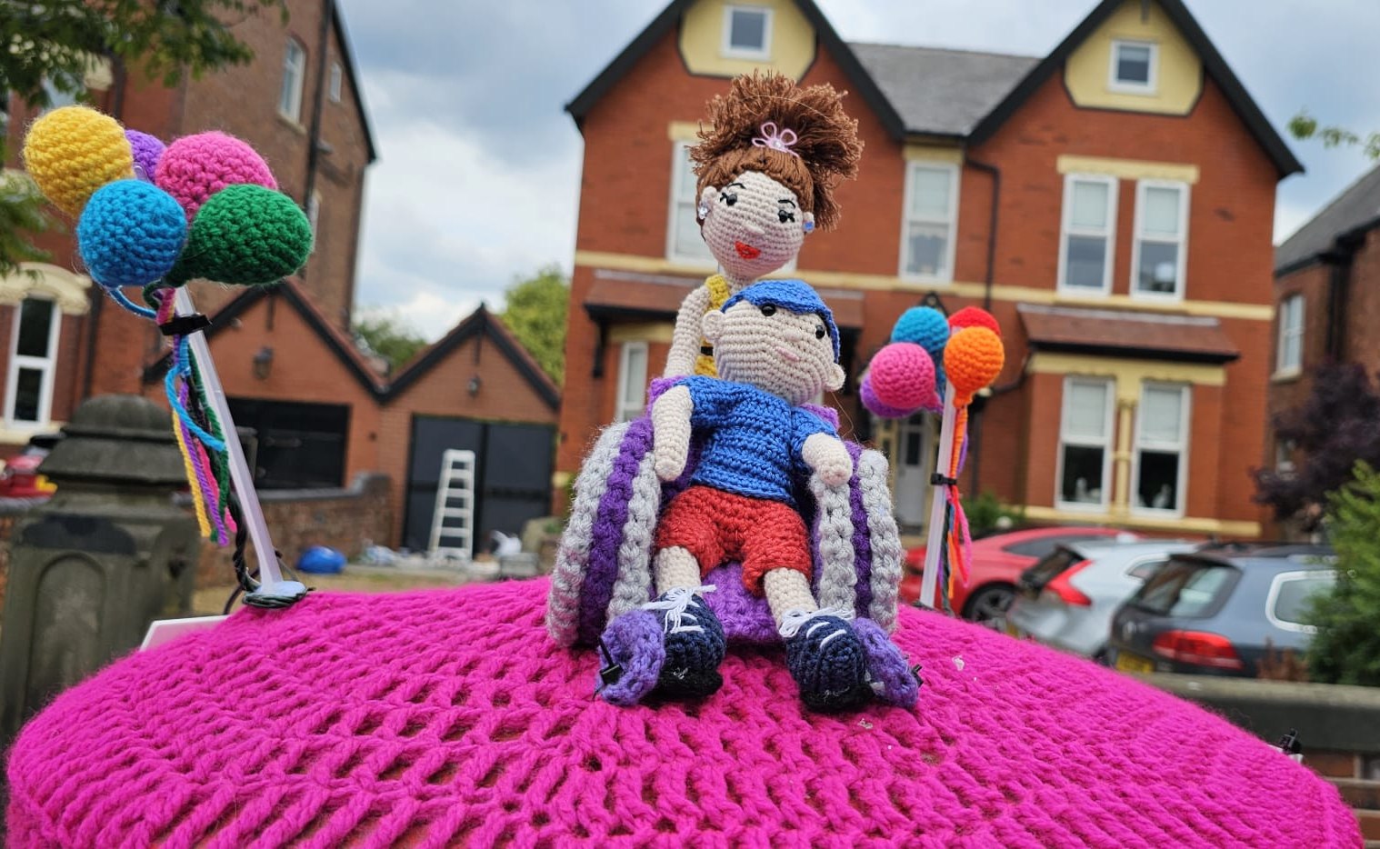 Southport crochet group, the Southport Hookers, have placed postbox toppers around Southport to raise awareness of national respite charity, Revitalises Give me a Break campaign. Photo by Southport Hookers