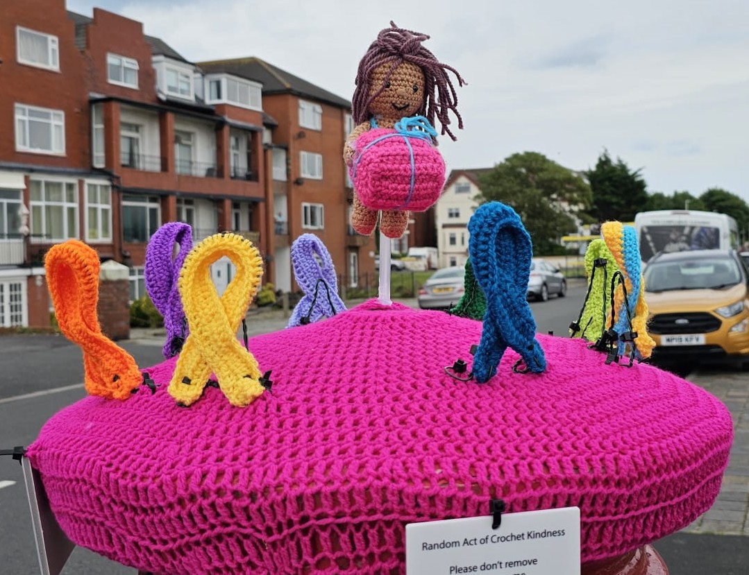 Southport crochet group, the Southport Hookers, have placed postbox toppers around Southport to raise awareness of national respite charity, Revitalises Give me a Break campaign. Photo by Southport Hookers