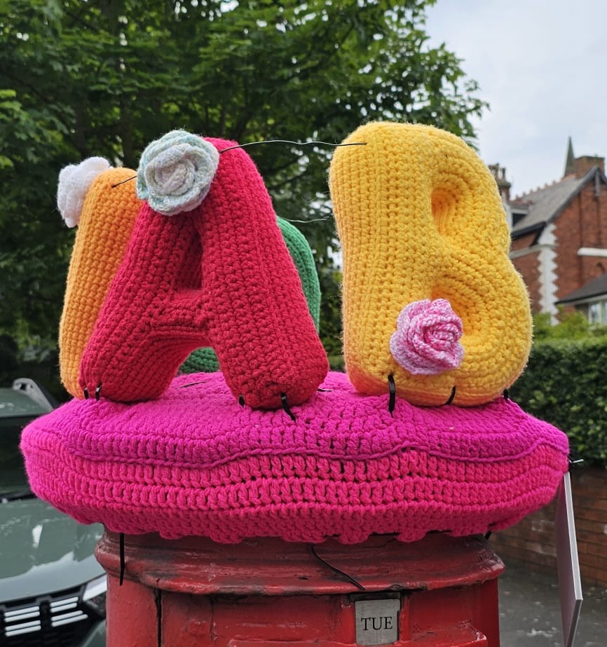 Southport crochet group, the Southport Hookers, have placed postbox toppers around Southport to raise awareness of national respite charity, Revitalises Give me a Break campaign. Photo by Southport Hookers