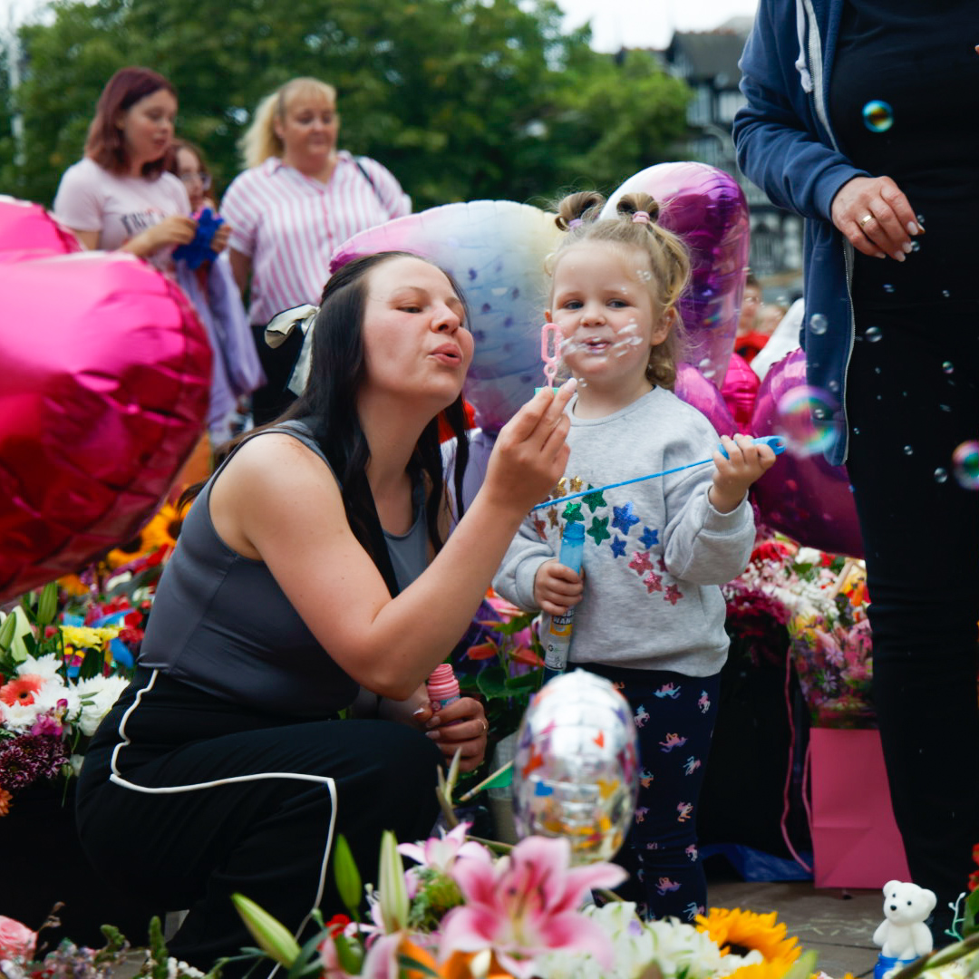 Thousands of families filled the Town Hall Gardens in Southport as they took part in the town's biggest ever bubble blowing event and blew kisses to heaven in memory of the three young girls killed in a tragedy this time last week. Photo by Zack Downey of Zed Photography for Stand Up For Southport