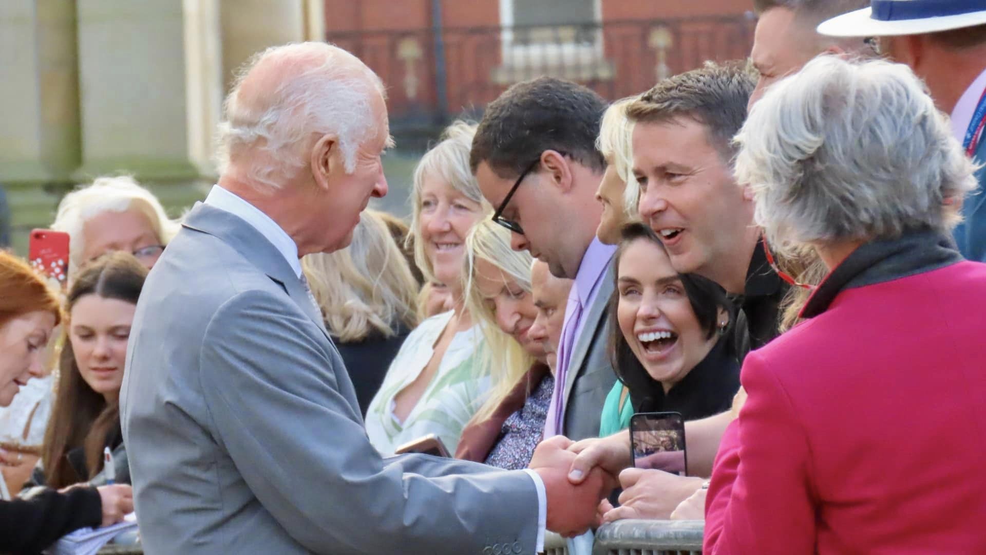 King Charles enjoys a royal visit in Southport. Photo by Andrew Brown Stand Up For Southport