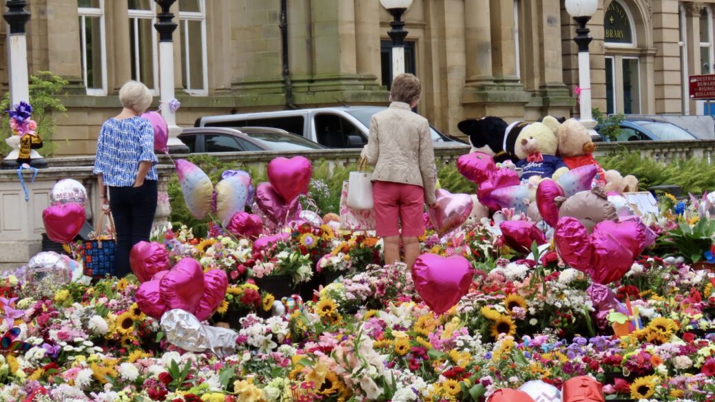 Families leave tributes to the three girls who died in Southport in the Town Hall Gardens in Southport. Photo by Andrew Brown Stand Up For Southport