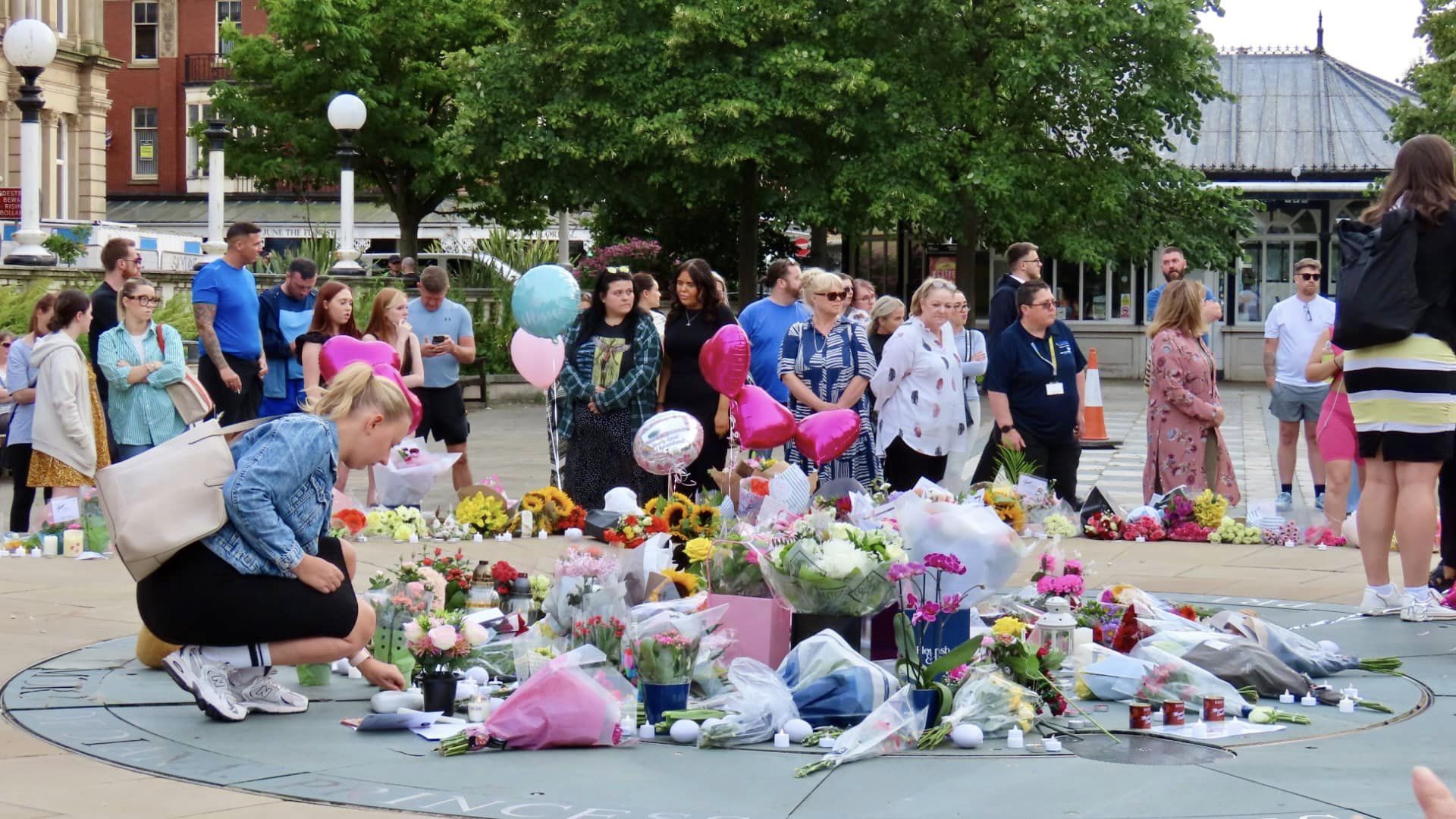Crowds attend the vigil in the Town Hall gardens in Southport after the tragic deaths of three young girls at The Hart Space in Southport on 29th July 2024. Photo by Andrew Brown Stand Up For Southport