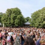 Crowds attend the vigil in the Town Hall gardens in Southport after the tragic deaths of three young girls at The Hart Space in Southport on 29th July 2024. Photo by Andrew Brown Stand Up For Southport