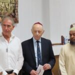 Muslim, Jewish and Christian faith leaders, local politicians, community leaders and members of the public today who took part in a Walk Of Unity from Southport Mosque on Sussex Road to Southport Synagogue on Arnside Road. Maurice Ostro OBE KFO, founder of the Ostro Fayre Share Foundation (left); Chair of Southport Synagogue Michael Braham (centre); and Ibrahim Hussein, Imam of Southport Mosque (right). Photo by Andrew Brown Stand Up For Southport