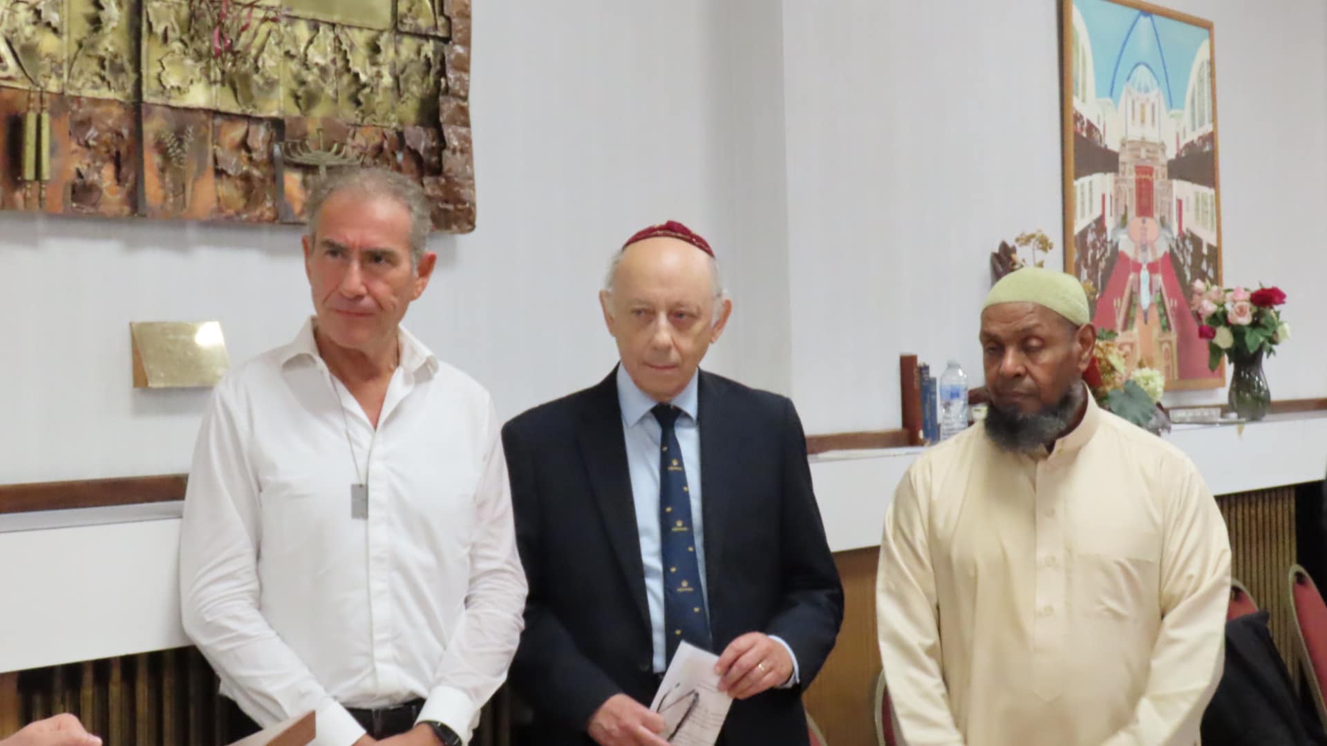 Muslim, Jewish and Christian faith leaders, local politicians, community leaders and members of the public today who took part in a Walk Of Unity from Southport Mosque on Sussex Road to Southport Synagogue on Arnside Road. Maurice Ostro OBE KFO, founder of the Ostro Fayre Share Foundation (left); Chair of Southport Synagogue Michael Braham (centre); and Ibrahim Hussein, Imam of Southport Mosque (right). Photo by Andrew Brown Stand Up For Southport