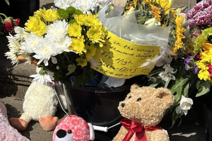 Tributes left in the Town Hall Gardens in Southport to the girls killed and injured in the tragedy at The Hart Space in Southport. Photo by Andrew Brown Stand Up For Southport