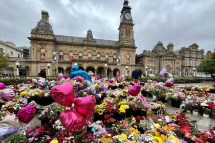 Thousands of tributes were set out in the Town Hall Gardens in Southport after the Southport tragedy. Photo by Andrew Brown Stand Up For Southport