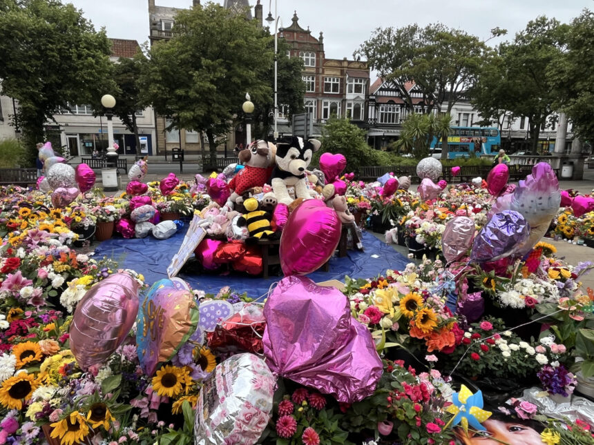 Tributes in the Town Hall Gardens in Southport after the Southport tragedy. Photo by Andrew Brown Stand Up For Southport