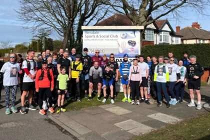 Alex Rigby at Ainsdale Sports and Social Club in Southport during his Running The Railways challenge of running past every Merseyrail train station. Photo by John Thompson