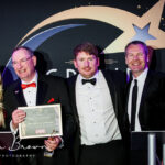 Rev Martin Abrams has been honoured with the Lifetime Achievement Award sponsored by LWC Drinks at the 2025 Grand Pride Of Sefton Awards. He was presented with his award by Mikhail Hotel and Leisure Group Managing Director Rob Ashcroft, alongside presenters Claire Simmo and Fraser Dainton