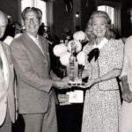 Southport and District Chrysanthemum Society is celebrating its 75th anniversary. George Connor (President), Bert Stanniforth (Show Secretary), Connie Creighton and a young Alan Foxall
