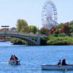 A scenic photo of families enjoying boat rides on the Marine Lake in Southport