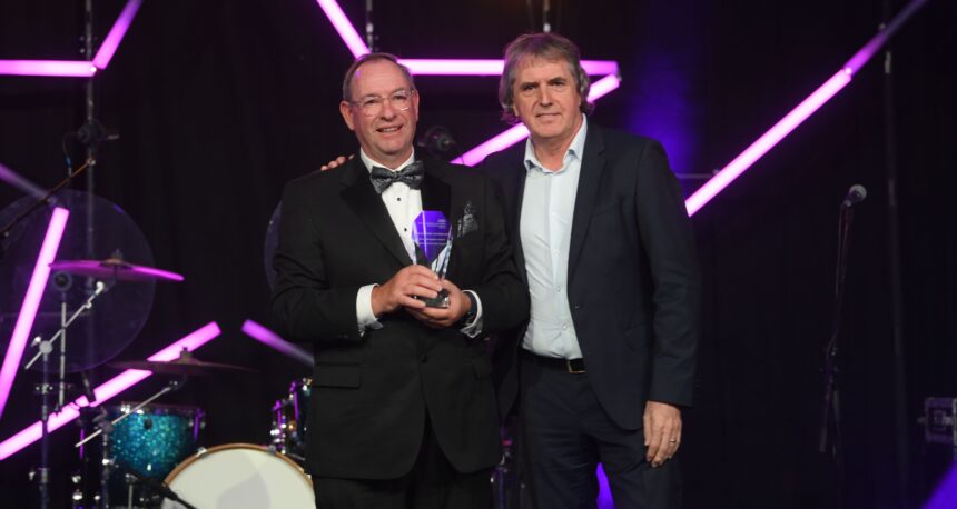 Rev. Martin Abrams MBE with Mayor of the Liverpool City Region, Steve Rotheram, and the Special Recognition Award at the Mersey and West Lancashire Teaching Hospitals NHS Trust staff awards