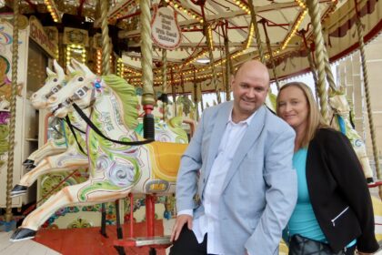 Eric and Louise Morris have celebrated their first wedding anniversary in Southport. The couple enjoyed their first date outside Silcock's Funland, where they later had wedding pictures taken. Photo by Andrew Brown Stand Up For Southport