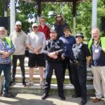 Mojo Hands, Southport Arts Festival organisers and Merseyside Police at the Bandstand on Lord Street in Southport. Photo by Andrew Brown Stand Up For Southport