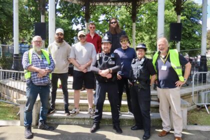 Mojo Hands, Southport Arts Festival organisers and Merseyside Police at the Bandstand on Lord Street in Southport. Photo by Andrew Brown Stand Up For Southport