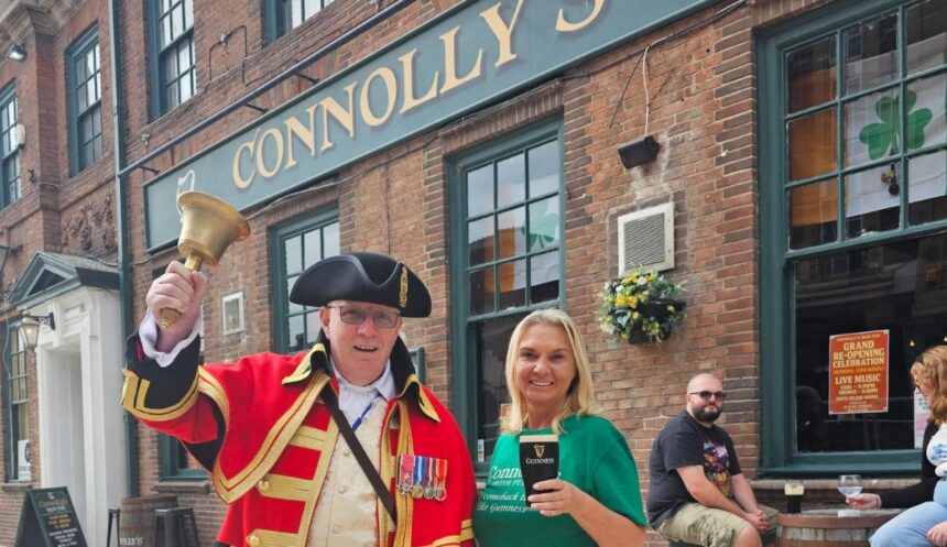Connolly's Irish pub in Southport has reopened. Southport Town Crier Kevin Ruane with owner Julie Goodwin