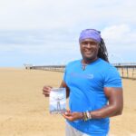 Sam Jalloh with his book Yes I Can. Photo by Andrew Brown Stand Up For Southport
