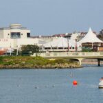 A scenic picture of sunny Southport, with the Marine Lake, the Venetian Bridge, Silcock's Carousel and Funland, and Kings Gardens. Photo by Andrew Brown Stand Up For Southport