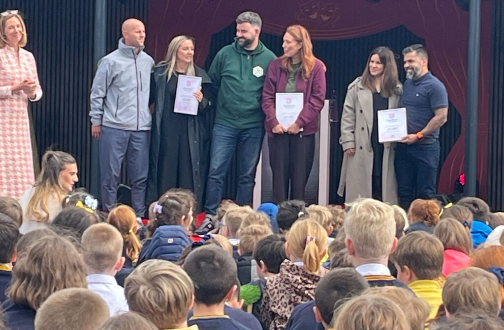Children enjoyed the official opening of the new playground at Churchtown Primary School in Churchtown in Southport. Left to Right - Elsie's, Bebe's and Alice's parents receive funds from fundraising for charities
