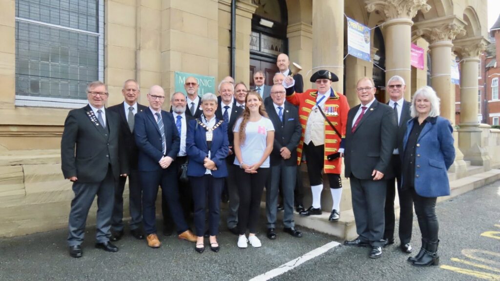 Southport MP Patrick Hurley; Mayor of Sefton Cllr June Burns; Southport Town Crier Kevin Ruane MBE; and festival organisers Heather Cook and others enjoy a Southport Heritage Open Days event at the Masonic Hall in Southport. Photo by Andrew Brown Stand Up For Southport