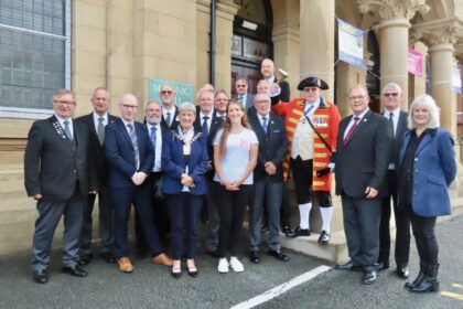 Southport MP Patrick Hurley; Mayor of Sefton Cllr June Burns; Southport Town Crier Kevin Ruane MBE; and festival organisers Heather Cook and others enjoy a Southport Heritage Open Days event at the Masonic Hall in Southport. Photo by Andrew Brown Stand Up For Southport