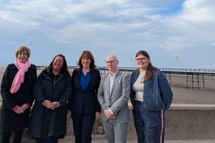 Chancellor Rachel Reeves has announced up to £20 million to restore and reopen Southport Pier. She is pictured (centre) with (from left): Cllr Sonya Kelly; Sefton Counci Leader Cllr Marion Atkinson; Southport MP Patrick Hurley; and Cllr Laura Lunn-Bates