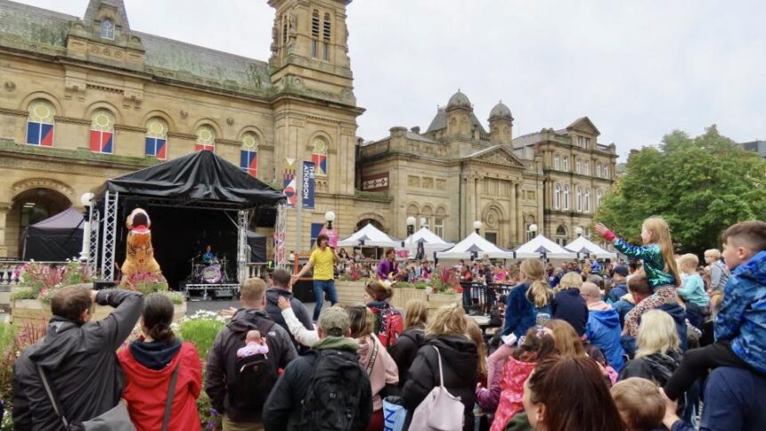 Families enjoy the Coastal Jam music festival in the Town Hall Gardens in Southport. Photo by Andrew Brown Stand Up For Southport