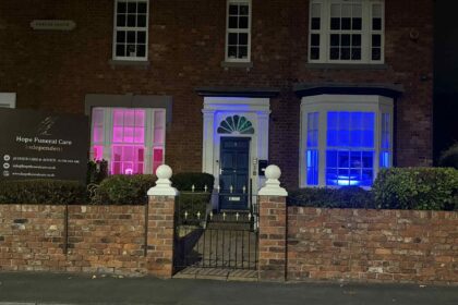Hope Funeral Care on Church Street in Southport has lit up its windows pink and blue in honour of Baby Loss Awareness Week