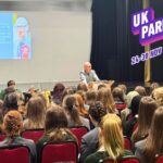Southport MP Patrick Hurley speaks with students at Greenbank High School in Southport