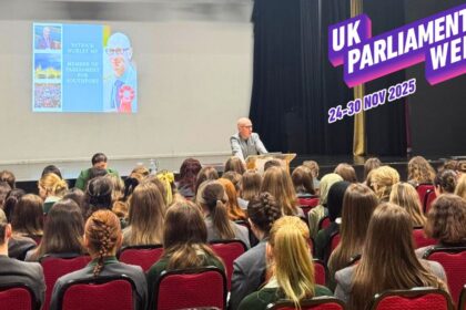 Southport MP Patrick Hurley speaks with students at Greenbank High School in Southport