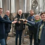 Colbier Beer Co, based in Bootle, was named the UK's best new Independent Brewery at the 2025 SIBA awards. In the image (left to right): Jamie Hannaway, InvestSefton Business Growth Advisor; Mike Mullin, Head of Business Growth & Investment; Peter Dowd MP; Mike Corbett; Cllr Paulette Lappin; Vik Williams