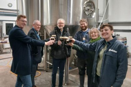 Colbier Beer Co, based in Bootle, was named the UK's best new Independent Brewery at the 2025 SIBA awards. In the image (left to right): Jamie Hannaway, InvestSefton Business Growth Advisor; Mike Mullin, Head of Business Growth & Investment; Peter Dowd MP; Mike Corbett; Cllr Paulette Lappin; Vik Williams