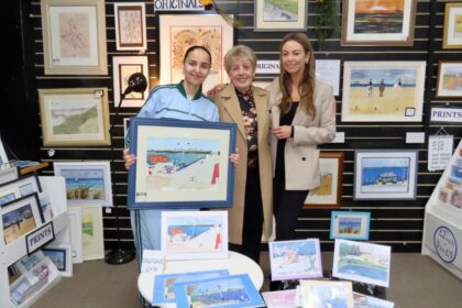 Southport artist Jane Lambert (centre) with Hannah Zachariah (left) and Serena Silcock-Prince (right) in Jane's art unit at the Royal Arcade on Lord Street in Southport. Photo by Andrew Brown Stand Up For Southport
