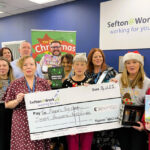 Sefton@Work Manager Linda Patterson and Sefton Mayor Cllr June Burns and members of the Bootle Strand Sefton@Work team launch the Mayor Of Sefton Toy Appeal