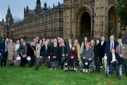 Phab attendees, supporters and staff posing together outside of the House of Lords